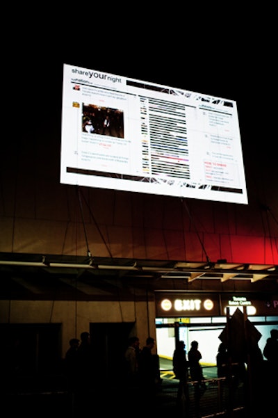 Nuit Blanche attendees were encouraged to tweet, text, and email their experiences for Share Your Night. Guests could watch the real-time interactions from three different screens, with one in each zone.