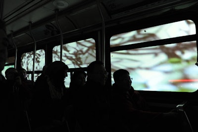 Video and animation projected onto the windows of the streetcar gave the illusion that it was moving.