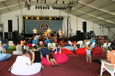 In the Good Kids Zone, activities included musical performances. In lieu of chairs, audience members reclined on giant floor pillows.