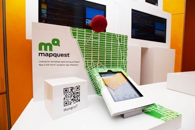 The information desk also incorporated a display for AOL subsidiary Mapquest, showcasing the mapping brand's iPad app and a QR code that linked to a special lunch giveaway.