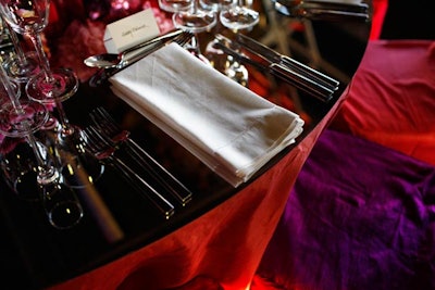 Although the fabric used for the dinner was colorful, the flatware, glassware, and napkins were kept simple.