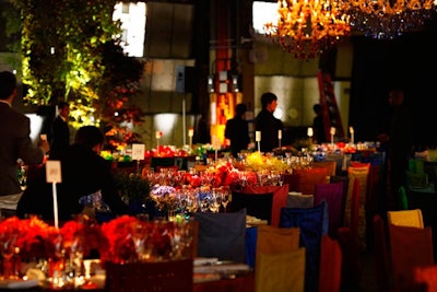 The bright colors used in the dining room's tablecloths and chair covers acted as a contrast to the site's raw industrial architecture.