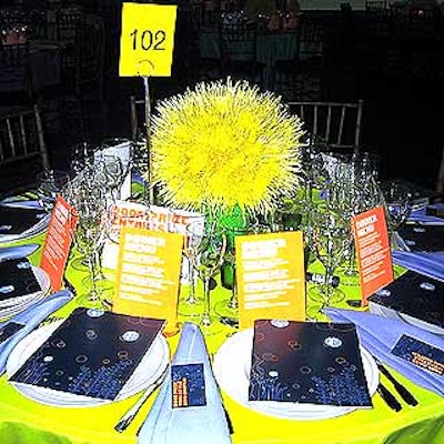 A centerpiece of yellow mums was arranged to look like coral.