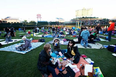 Guests were able to picnic on the outfield at Wrigley Field. 'We provided Chicagoans with never-been-done-before access to [the ballpark],' said planner Noelle Provencial.