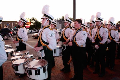 A marching band came from Glenbrook North High School, where much of the movie was filmed. Before the screening, the band marched to center field and played 'Twist and Shout.'