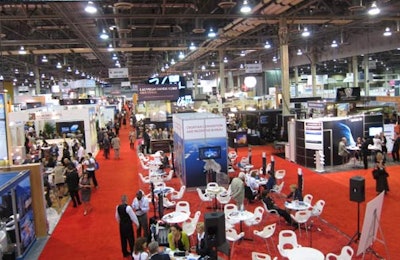 The IMEX America show floor, seen from M.P.I.'s two-story exhibit, buzzed with international attendees and exhibitors.