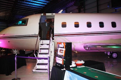 Cars, motorcycles, and airplanes served as decor inside the Galaxy Aviation hangar.