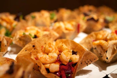 Snacks were served buffet-style and menu items incorporated golden and yellow hues.