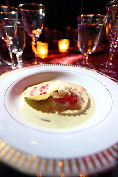 Dinner began with oversized ravioli filled with ricotta cheese and puree of heirloom beets topped with sage and leek emulsion sauce and roundels of Ciogga beets.