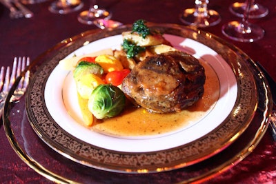 Occasions served sautéed lamb shank with fingerling potatoes and an assortment of brussels sprouts, baby carrots, patti pan squash, and current tomatoes for the main course.