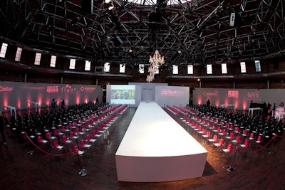 PBD created the all-white runway and brought in chandeliers.
