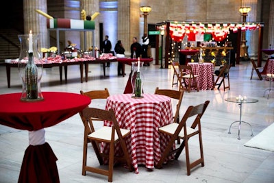 Guests ate their garlic bread and fusili in an area reminiscent of an old-school Italian restaurant, with candles in wine bottles and checked tablecloths.