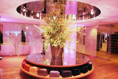 Known for his sculptural sensibility, Nishimori also designed the large floral tree that rested in a glass cube on the store's third floor.