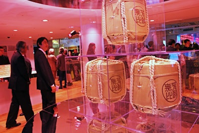 Inside the store, Stefan Beckman designed props to complement the built-in decor, including three traditional sake barrels in Lucite cases, which were placed on the third floor for the event.