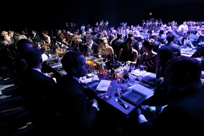 More than 500 guests sat at long dinner tables.