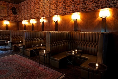 Brown leather, high-back booths line one wall, opposite the bar, in the main room.