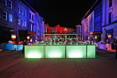 A glowing green bar stood at the entry to the after-party.