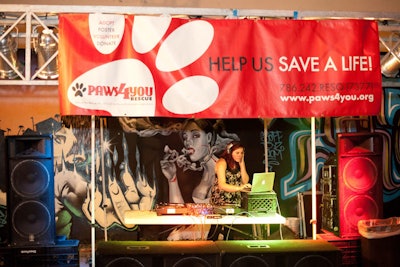 In an outdoor booth, DJ Run Sevim Run spun music between band sets.