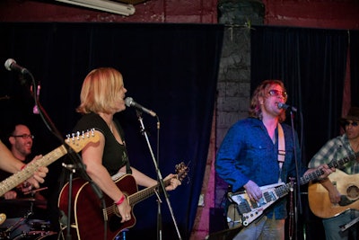 The fund-raising concert's main musical act was Hail Mary, a band comprising Jodi Marr and Jim Camacho (pictured) as well as Dylan Schiavone and Jordan Welch.
