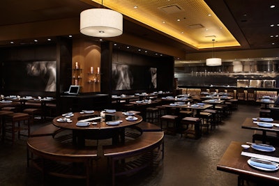 Located just behind the main bar, the East dining room has picnic-style seating at tables for two, four, and eight that can be combined for larger parties.