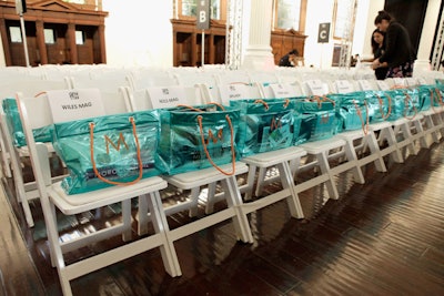 Presenting sponsor Moroccanoil filled bags on guests' seats.