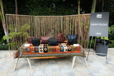 Iman Toloui showed bags on an ethnic-print tabletop at the event.