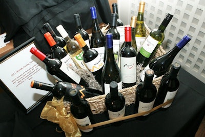 Guests bid on a gift basket filled with a bottle of every wine served at the event and gift certificates to the participating restaurants.