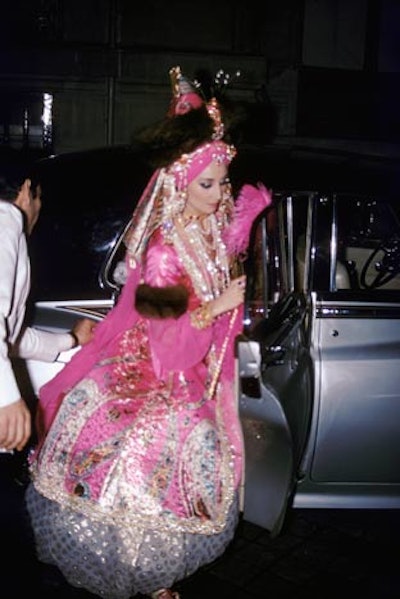 Vicomtesse Jacqueline de Ribes, who has been a member of the International Best-Dressed Hall of Fame since 1962, wore a costume of her own design at the Oriental Ball in 1969, thrown by Alexis von Rosenberg, the Baron de Réde, in Paris. Other notable guests at the Oriental Ball included Salvador Dali and his muse, Amanda Lear.