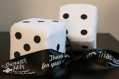 When guests picked up their cars from the valet at the end of the night, they found a pair of fuzzy dice hanging from their cars' rearview mirrors, with a thank-you message on the ribbon.