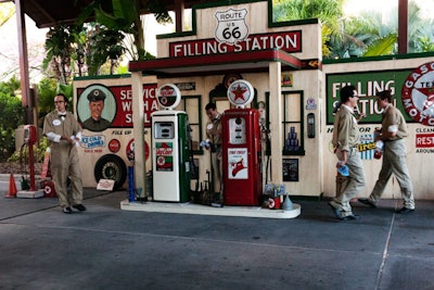 As cars pulled in to the hotel's valet, costumed attendants would ring a bell to mimic the sound of an old-fashioned filling station.