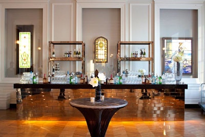 The cocktail reception took place in the museum's Chicago room. Mirrored brick bars with accessorized back shelves anchored both ends of the space.