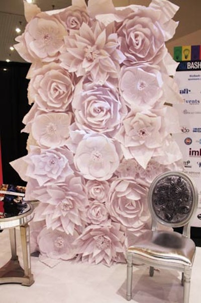 Luxe Event Rentals & Décor showcased handmade paper flower walls. The panels can be customized in different colors and function as room dividers, stage backdrops, back-bar displays, and more.