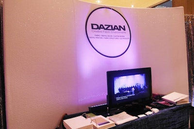 Dazian debuted its spangle mesh fabric wrapped around the company's new curve wall, noting that the company can now cover curved structure walls with a variety of textured and novelty fabrics.