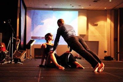 Video art projects decorated the ballroom walls as dancers took to the stage during dinner at the Miami Beach Arts Gala.