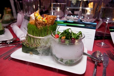 The salads were served alongside a trio of cones filled with salmon mousse, crab ceviche, and Asian vegetables, which were presented in a bed of wheat grass with a butterfly-shaped Parmesan crisp. The dish was inspired by the Vertical Farm Project.
