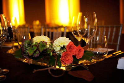 At the V.I.P. dinner, rustic centrepieces and amber lighting were taken from the colours in Botticelli's painting Primavera.