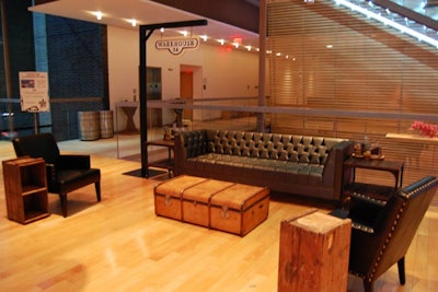 Adjacent to its tastings bar, Balvenie created a masculine lounge comprising leather and vintage furniture.
