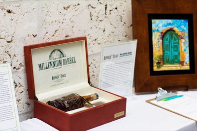 Guests bid on more than 80 items in the silent auction, including Buffalo Trace's Millennium Barrel bourbon.