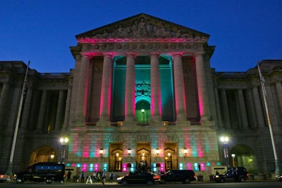 EventEQ uplit the facade of the venue in pink and aqua, two of the night's main decor colors.