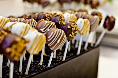 Three kinds of cheesecake lollipops were brought out for dessert: white chocolate cheesecake covered in milk chocolate; pumpkin cheesecake covered in white chocolate and caramel; and chocolate cheesecake covered in dark chocolate and Skor.