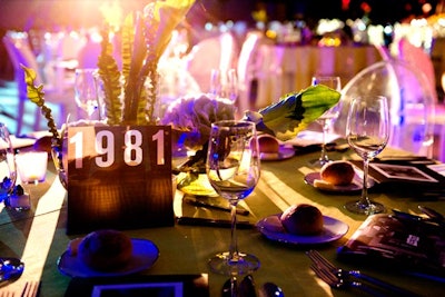 Each table number represented a year in the museum's 75-year history. Centerpieces were by Winston Flowers.