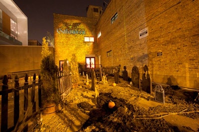 A graveyard lined the walkway to the entrance.