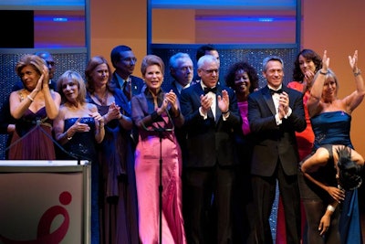 All of the presenters and award winners joined the choir on stage towards the end of the song.