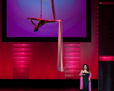 Opera singer Denyce Graves opened the program singing 'Habanera' accompanied by a silk aerialist.