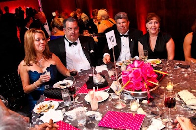 Campbell Peachy alternated silver and pink linens from DC Rental on the tables at the after-party.