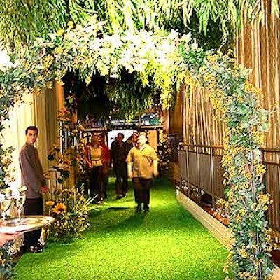 For ShoPro's Hamtaro launch event, the entryway of the Lighthouse at Chelsea Piers was decorated with faux grass and steel arches wrapped with vines and mini-sunflowers. Tree branches from American Foliage hung from the ceiling.