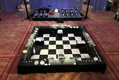 A black- and white-tiled floor in the reception area transformed from a bar area to a dance floor after the main program.