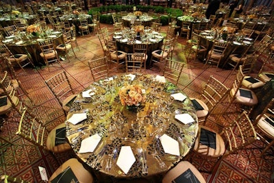 To mark the station’s golden 50th anniversary, decor included gold tablecloths, gold chairs, gold-rimmed glasses and chargers, and dusty pink roses on each tabletop.