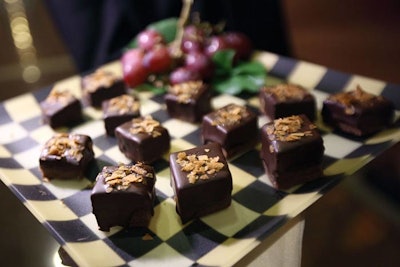 Servers passed desserts like miniature brownies topped with nuts.