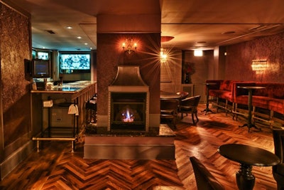 The cozy upstairs space also has a fireplace.